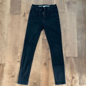 High waisted button up black skinny jeans